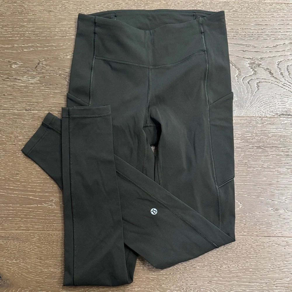 Lululemon High Rise Running Leggings Olive Green Size 4 Side Pockets Zip Back